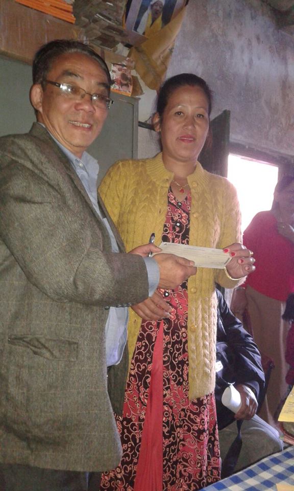 Beneficiaries of Kalimpong receiving the cheque in Kalimpong today