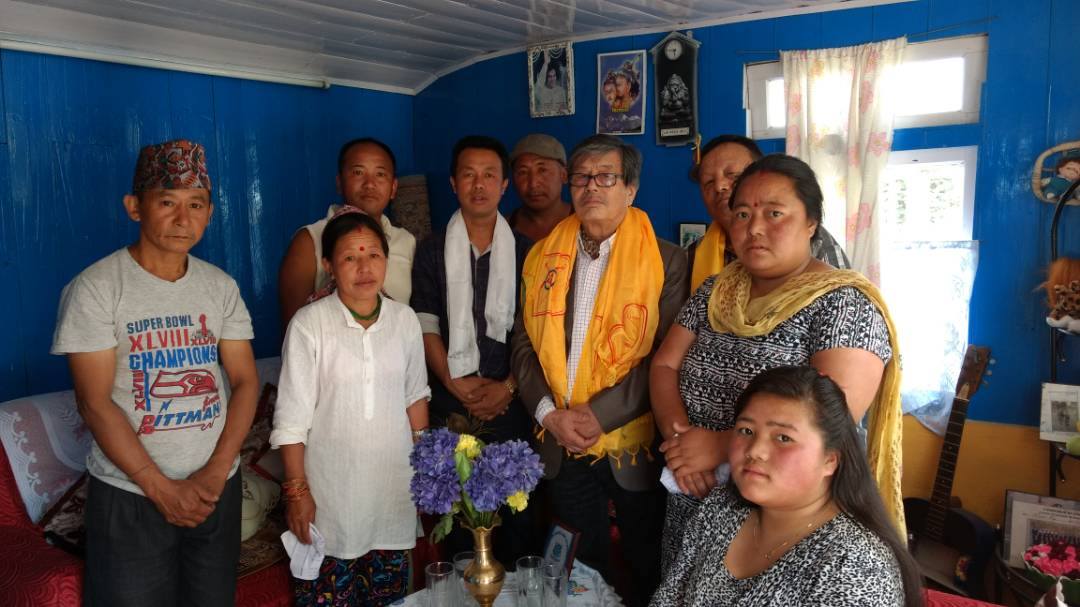 Board team with beneficiary members at site in Mirik